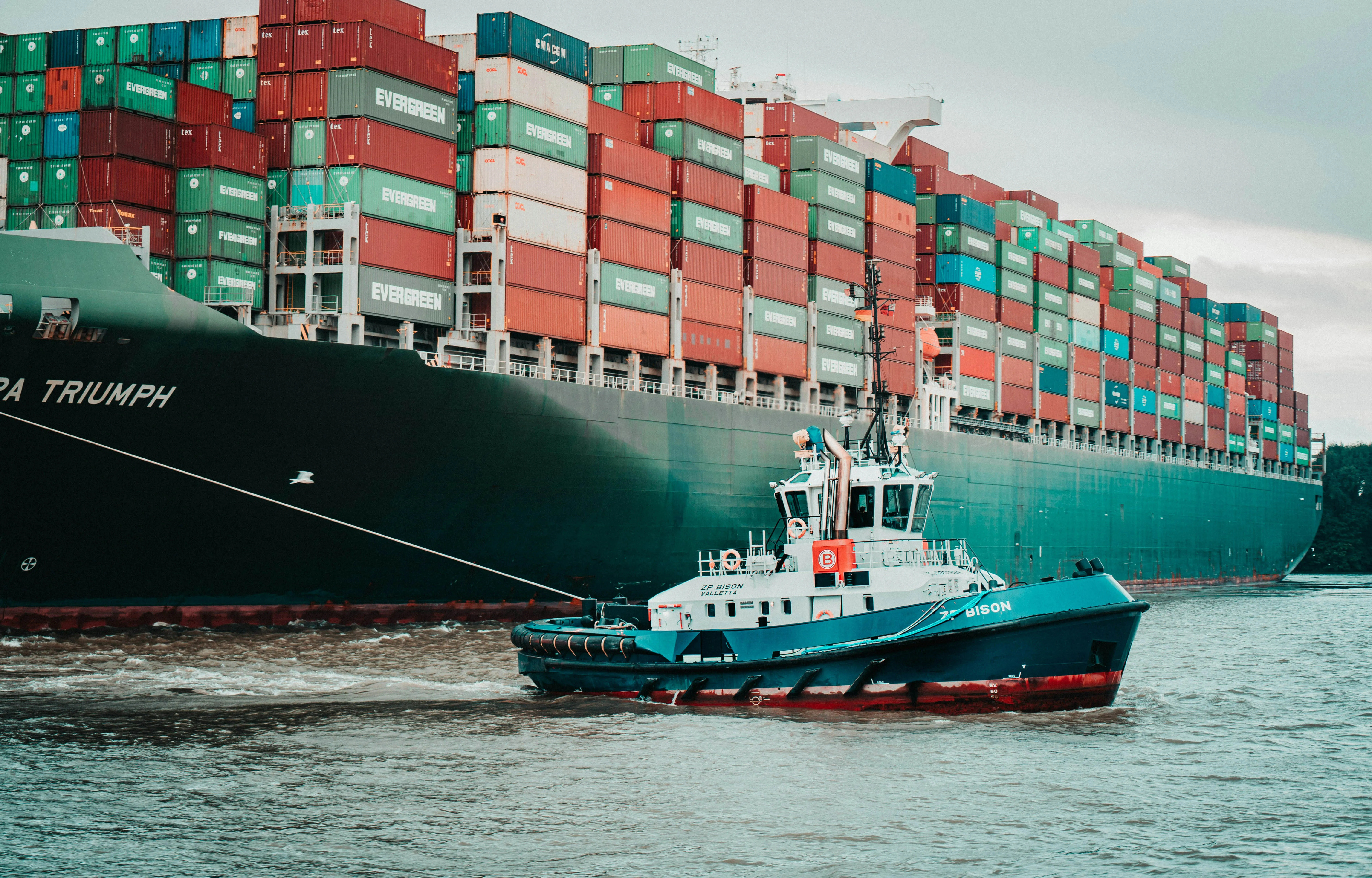 a Little Pilot Boat Helping the Big Ships Around